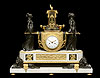 An important Louis XVI gilt and patinated bronze and white marble mantel clock of eight day duration representing Vestal Virgins Carrying the Sacred Fire, with movement by Pierre-Claude Raguet-LÃƒÆ’Ã†â€™Ãƒâ€šÃ‚Â©pine 